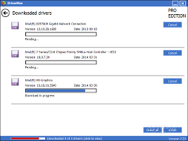 Showing the DriverMax panel with pending and downloaded drivers